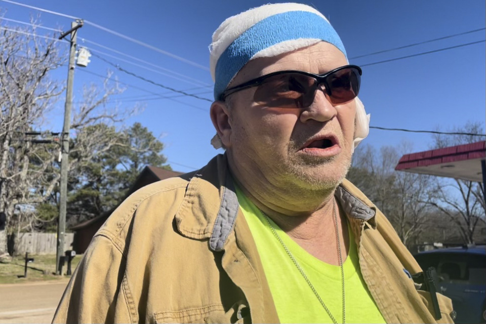<strong>George Drane, who survived a mass shooting Friday that claimed the lives of six people, speaks Saturday, Feb. 18, 2023, in front of a convenience store where the shootings began in Arkabutla, Miss. Drane&rsquo;s girlfriend, Debra Crum, was the ex-wife of the shooting suspect, Richard Dale Crum.</strong> (Michael Goldberg/AP)