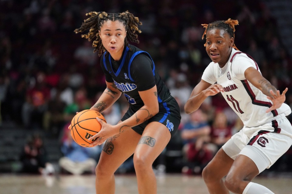 <strong>Memphis guard Madison Griggs (2) is defended by South Carolina guard Talaysia Cooper (11) during the first half of an NCAA college basketball game Saturday, Dec. 3, 2022, in Columbia, S.C.</strong> (Sean Rayford/AP)