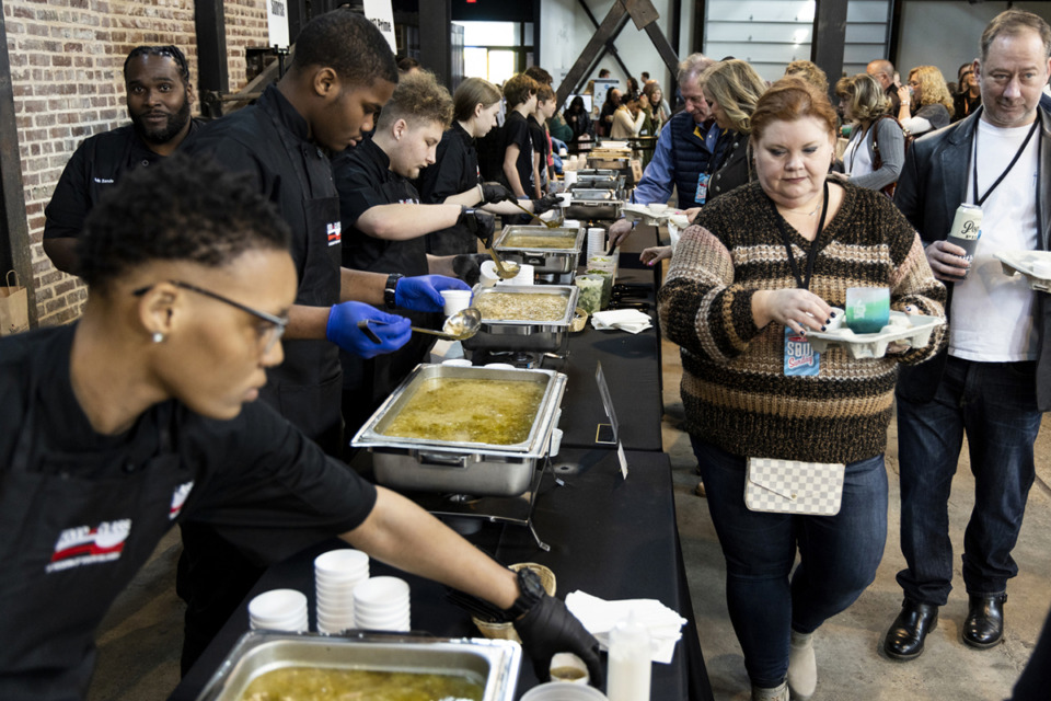 <strong>People make their way down the food line during the annual Soup Sunday fundraiser for Youth Villages' Chris Crye Mentoring Program on Sunday, Feb. 19.</strong> (Brad Vest/The Daily Memphian)