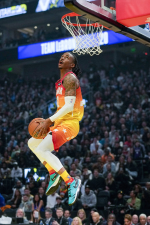 Ja Morant (12) shoots for Team Giannis during the first half of the NBA basketball All-Star game Sunday, Feb. 19, 2023, in Salt Lake City. (Rick Bowmer/AP Photo)