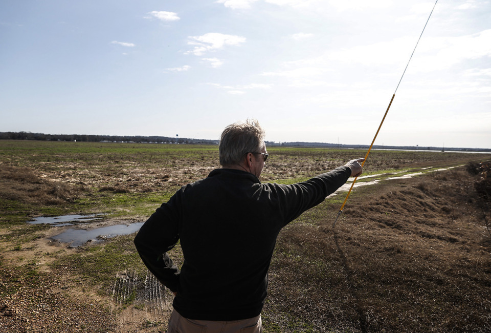 <strong>DeSoto County Supervisor Ray Denison points out an area located off Old U.S. 61 on Dec. 16, 2022, that will be the site of the county&rsquo;s first solar farm in Walls, Mississippi.</strong> (Mark Weber/The Daily Memphian file)