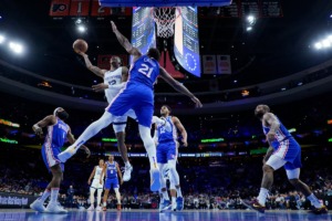 <strong>Memphis Grizzlies' Ja Morant (left), goes up for a shot against Philadelphia 76ers' Joel Embiid during the first half Thursday, Feb. 23, 2023, in Philadelphia.</strong> (Matt Slocum/AP)