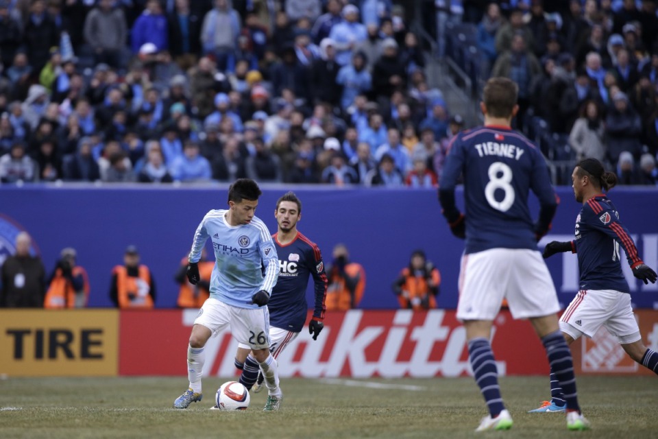 <strong>Sebastian Velasquez dribbles the ball during the first half of an MLS soccer game against the New England Revolution at Yankee Stadium in New York, Sunday, March 15, 2015.</strong> (AP Photo/Seth Wenig)
