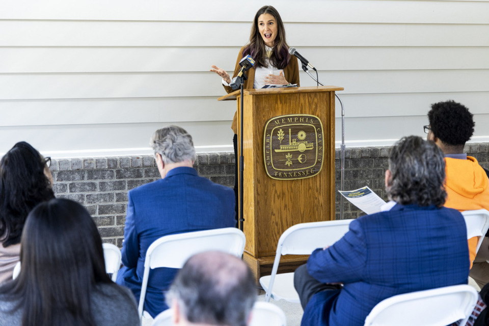 <strong>Amy Schaftlein, director of United Housing Inc., speaks during the ribbon cutting for Wolf River Bluffs, an affordable housing subdivision in Frayser.</strong> (Brad Vest/Special to The Daily Memphian)