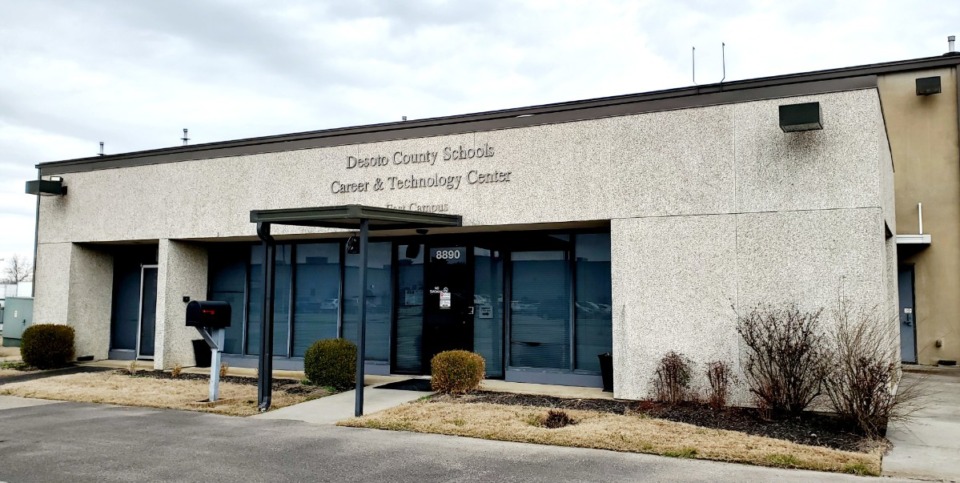 <strong>The two-toned, tan building that houses DeSoto County Career and Technology Center was constructed in the 1970s. Olive Branch officials tabled a request by DeSoto County Schools to put additional classroom trailers at the site for an HVAC program.</strong> (Toni Lepeska/The Daily Memphian)