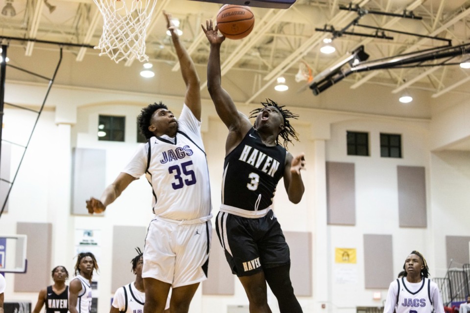 <strong>Whitehaven&rsquo;s Joe Williams (right) goes up for a shot during Saturday&rsquo;s game between Southwind and Whitehaven in quarterfinals of the Region 8-AAAA tournament, Feb. 25, 2023 at Southwind.</strong> (Brad Vest/Special to The Daily Memphian)