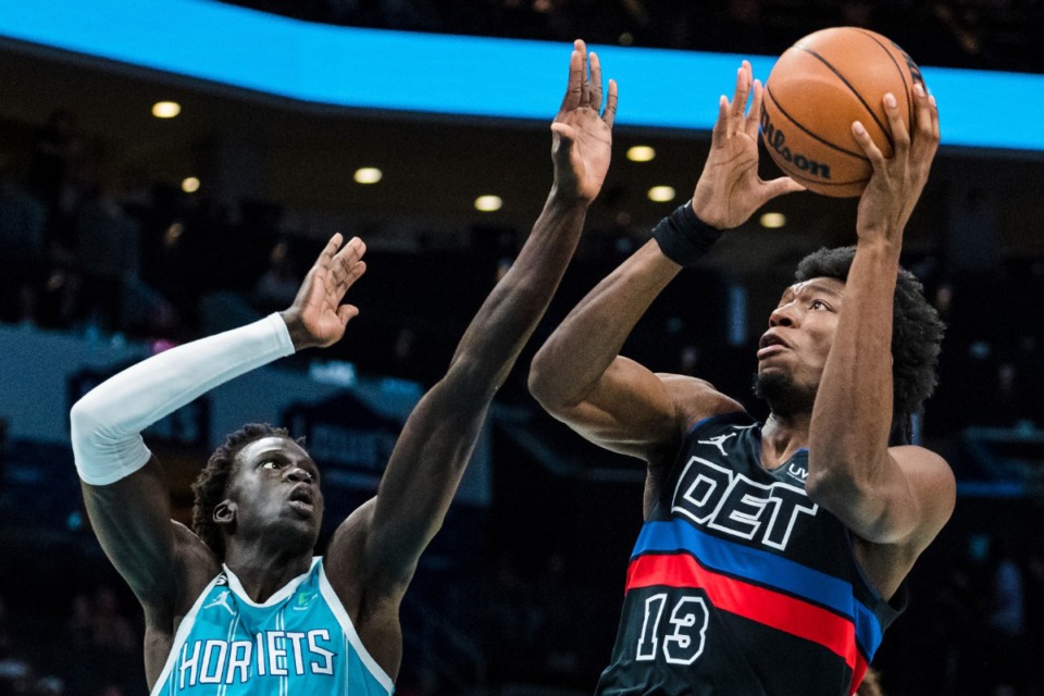 <strong>Detroit Pistons center James Wiseman (13) drives to the basket as Charlotte Hornets forward JT Thor (21) attempts to block him during an NBA game in Charlotte, N.C., Monday, Feb. 27, 2023.</strong> (Jacob Kupferman/AP Photo)