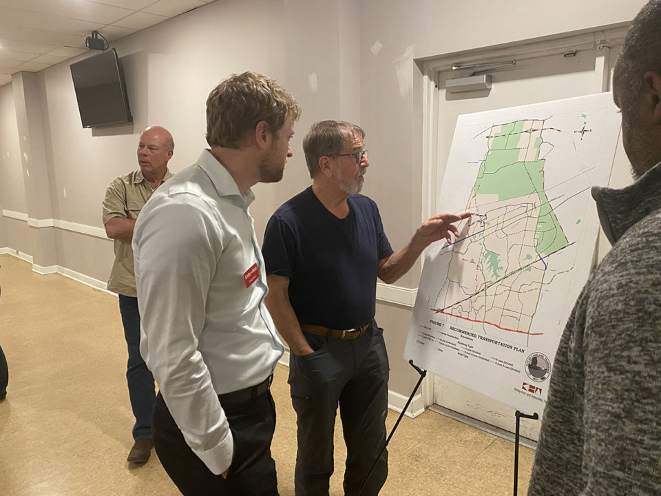 <strong>Lakeland held a comprehensive plan community engagement workshop Tuesday. Kimley-Horn's civil engineer Doug Swett (foreground left) listens to feedback from resident Boyd Ruppelt (center).</strong> (Michael Waddell/Special to The Daily Memphian)