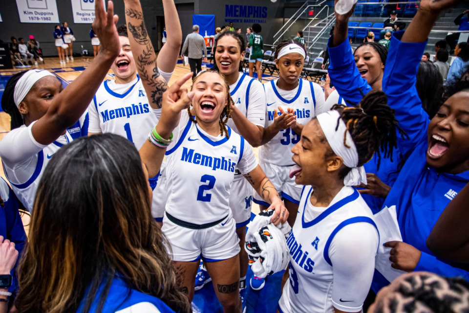 <strong>The Memphis women&rsquo;s basketball team celebrates after Wednesday&rsquo;s victory over Tulane. The Tigers clinched the 2-seed in next week&rsquo;s AAC tournament in Fort Worth, Texas.</strong> (Courtesy Memphis Athletics/Matthew A. Smith)