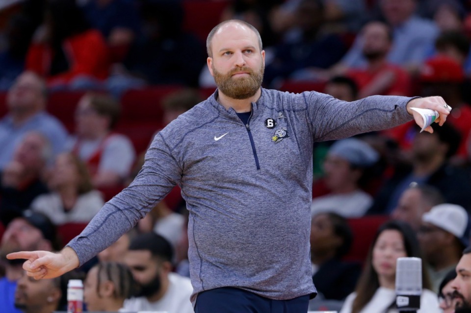 <strong>Memphis Grizzlies head coach Taylor Jenkins directs plays against the Houston Rockets during the second half of an NBA basketball game Wednesday, March 1, 2023, in Houston.</strong> (AP Photo/Michael Wyke)