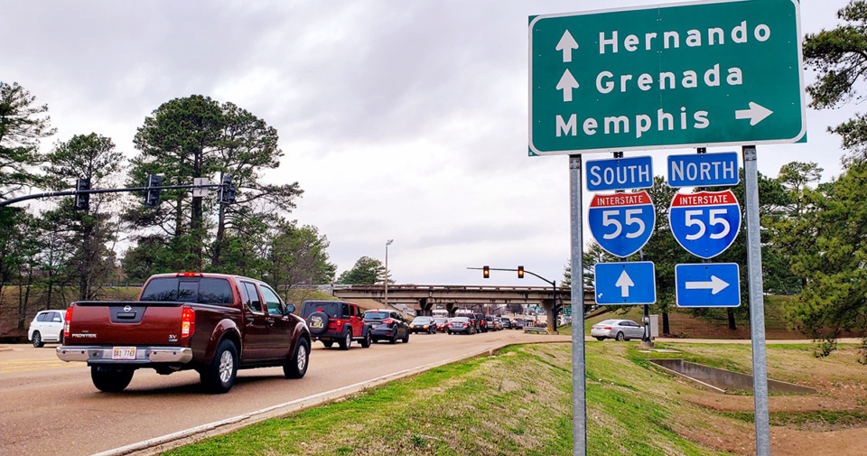 <strong>A line of traffic waits under the interstate overpass on Commerce Street in Hernando to turn north onto I-55. In addition to the turn lane, four other lanes pass under the narrow passageway under the bridge.</strong> (Toni Lepeska/Special to The Daily Memphian)