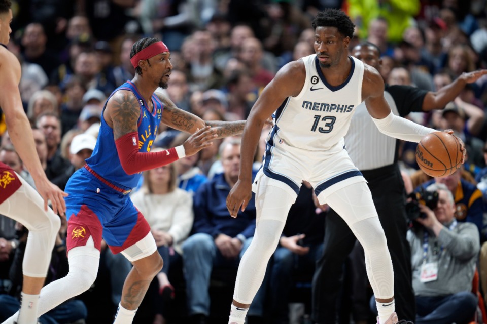 <strong>Memphis Grizzlies forward Jaren Jackson Jr., right, looks looks for an opening past Denver Nuggets guard Kentavious Caldwell-Pope on Friday, March 3, 2023, in Denver.</strong> (David Zalubowski/AP)