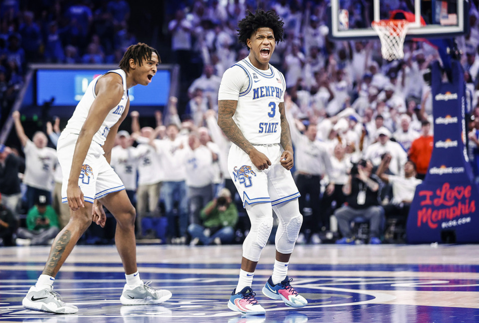 <strong>Memphis Tigers guard Kendric Davis (right) celebrates a 3-pointer against Houston during action on Sunday, March 5, 2023.</strong> (Mark Weber/The Daily Memphian)