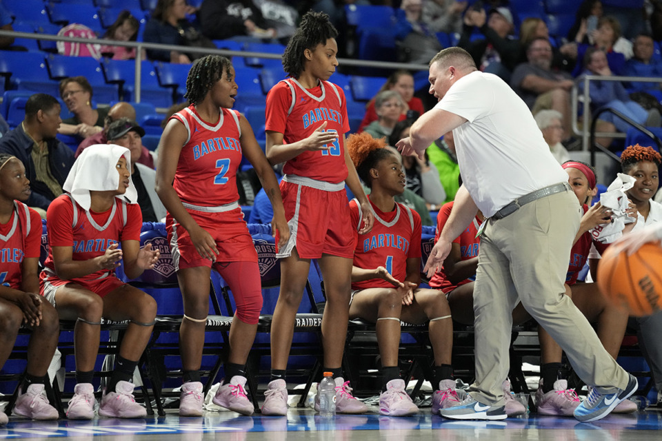 <strong>Bartlett head coach Wes Shappley congratulates his players in the final moments of their win over Sevier County during a Class 4A game in the TSSAA BlueCross girls&rsquo; state basketball tournament March 7 in Murfreesboro, Tenn.</strong> (Mark Humphrey/Special to The Daily Memphian)