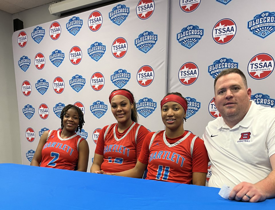 <strong>Left to right: Nevaeh Scott, Mallory Collier, Raven Sims and Bartlett High School Panthers coach Wes Shappley.</strong> (John Varlas/The Daily Memphian)