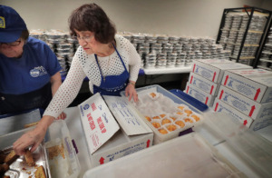 <strong>Anna Denton and Odette Patrikios (left) make a tray of assorted pastries as volunteers hurry to finish preparations for the annual Greek Festival at Annunciation Greek Orthodox Church on May 10, 2019. The Greek Fest runs Friday and Saturday from 11 a.m. to 8 p.m. with a variety of Greek food, live entertainment and vendors.</strong> (Jim Weber/Daily Memphian)