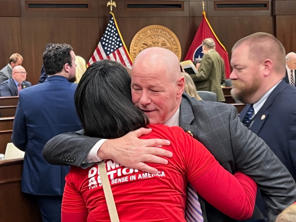 <strong>Tennessee Bureau of Investigation Director David Rausch hugs a gun-safety advocate on Wednesday, March 8, after a hearing of the House Civil Justice Committee.</strong> (Ian Round/The Daily Memphian)