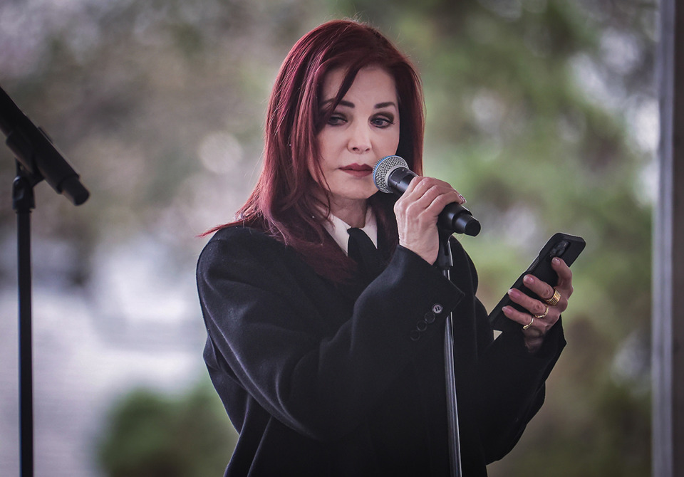 <strong>Priscilla Presley speaks during a memorial service for her daughter, Lisa Marie Presley, at Graceland in Memphis. She is challenging a document that would make her granddaughter, 33-year-old actress Riley Keough, the sole trustee to what&rsquo;s left of the family&rsquo;s stake in Elvis&rsquo; empire.</strong> (Patrick Lantrip/The Daily Memphian file)