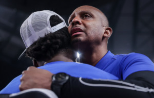 <strong>University of Memphis coach Penny Hardaway hugs his players after winning the AAC Championship Game against the University of Houston on March 11, 2023.</strong> (Patrick Lantrip/The Daily Memphian)