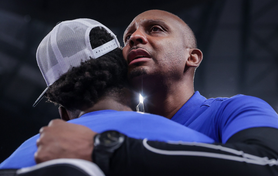 <strong>University of Memphis coach Penny Hardaway hugs his players after winning the AAC Championship Game against the University of Houston on March 11, 2023.</strong> (Patrick Lantrip/The Daily Memphian)