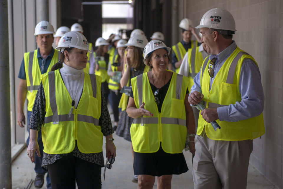 <strong>Germantown Municipal School District Superintendent Jason Manuel (right) talks with school board members Linda Fisher&nbsp; (center) and Betsy Landers (left) during a tour of the construction site of Forest Hill Elementary School May 8, 2019 in Germantown.</strong> (Brandon Dill/Special To The Daily Memphian)