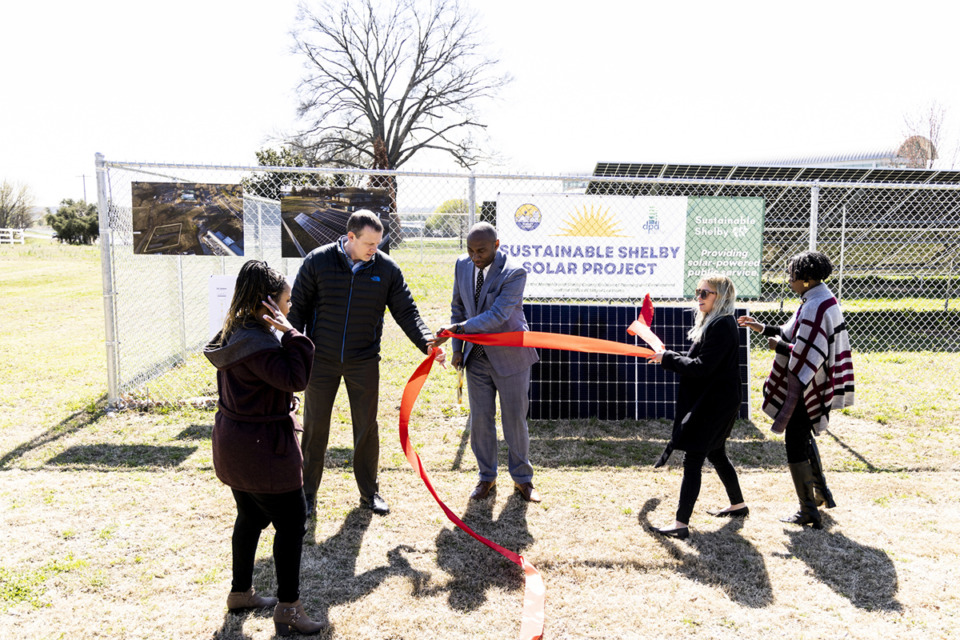 <strong>Shelby County Mayor Lee Harris (center) prepares for a ribbon cutting ceremony at the site of a new Sustainable Shelby solar project near the Shelby County Construction Code Enforcement building on March 14, 2023.</strong> (Brad Vest/Special to The Daily Memphian)