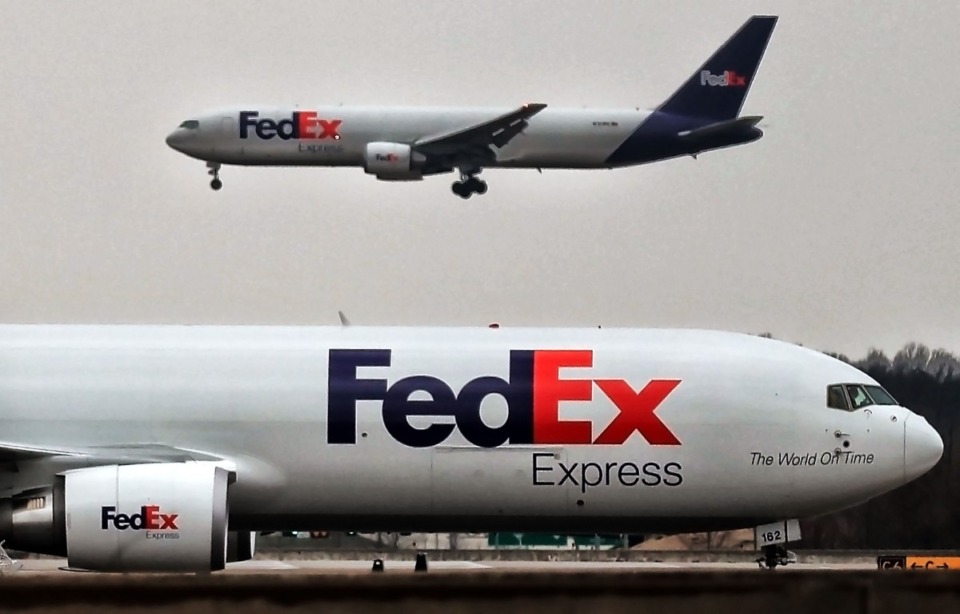 <strong>FedEx planes land throughout the day as Memphians get a close look during a bus tour of the Memphis International Airport.</strong>&nbsp;(The Daily Memphian file)