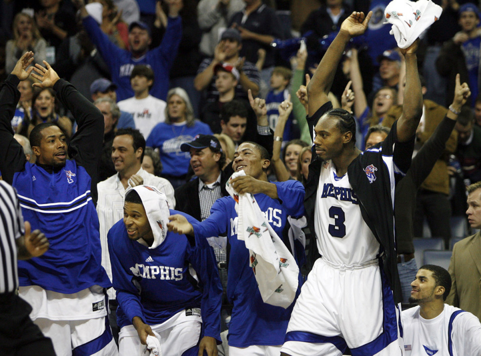 <strong>Memphis players Antonio Anderson (from left) Chris Douglas-Roberts, Derrick Rose, Joey Dorsey (3) and Shawn Taggart react to their victory over Southern Mississippi in the second half of a college basketball game Jan. 19, 2008, in Memphis. The Tigers won 83-47.</strong> (The Daily Memphian file)