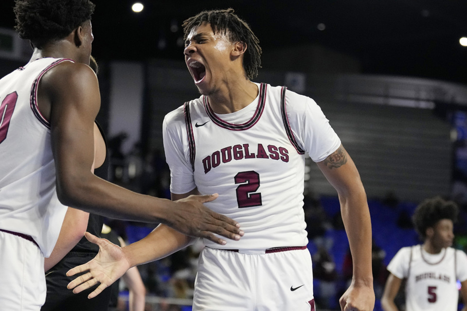 <strong>Douglass forward Tyler Johnson (2) celebrates after a score against Giles County during the first half of a Class 2A game in the TSSAA boys state basketball tournament Friday, March 17, 2023, in Murfreesboro.</strong> (Mark Humphrey/Special to The Daily Memphian)