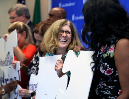 <strong>Sally Jones Heinz, president &amp; CEO of MIFA, laughs with Rep. London Lamar during a press conference Monday, May 13, 2019.</strong> (Patrick Lantrip/Daily Memphian)