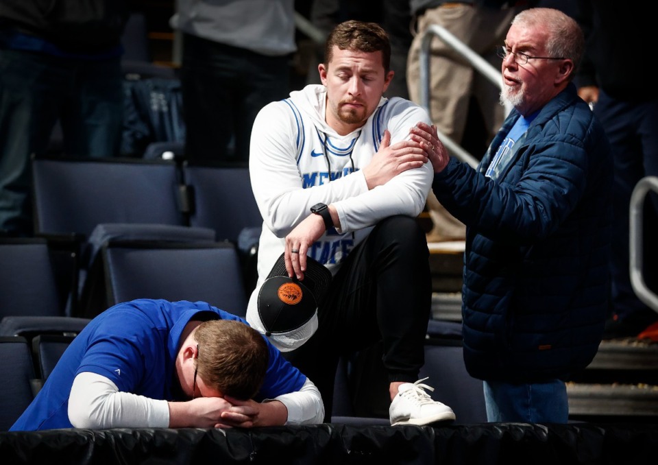 <strong>Dejected University of Memphis fans react after the Tigers lost to Florida Atlantic University in the NCAA Tournament game on Friday, March 17, 2023, in Columbus, Ohio.</strong> (Mark Weber/The Daily Memphian)