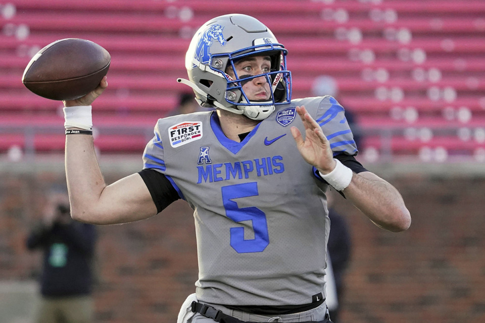 <strong>Memphis quarterback Seth Henigan (5) throws the ball during the second half of the First Responder Bowl NCAA college football game against Utah State Dec. 27, 2022, in Dallas.</strong> (Sam Hodde/AP Photo file)