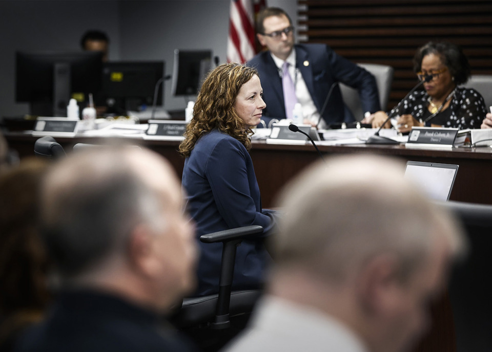 <strong>City of Memphis chief legal officer Jennifer Sink (middle) sought a legal opinion that said candidates for mayor must have lived in the city at least five years before the Oct. 5 election day.</strong> (Mark Weber/The Daily Memphian)