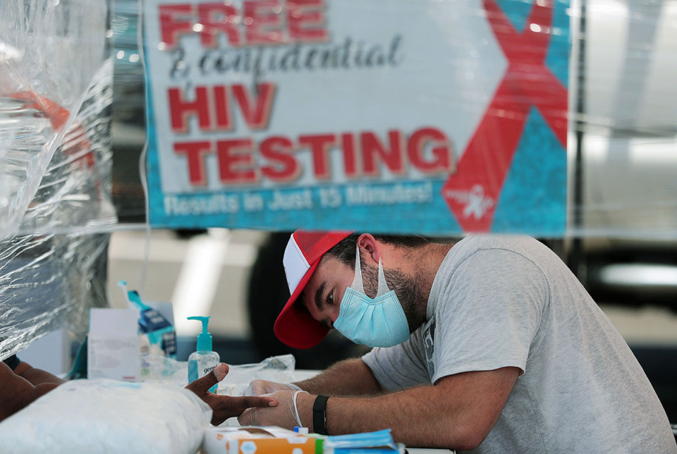 <strong>David Closs with Friends for Life administers free HIV testing during an overdose prevention event in Frayser July 11, 2020.</strong> (Patrick Lantrip/The Daily Memphian file)