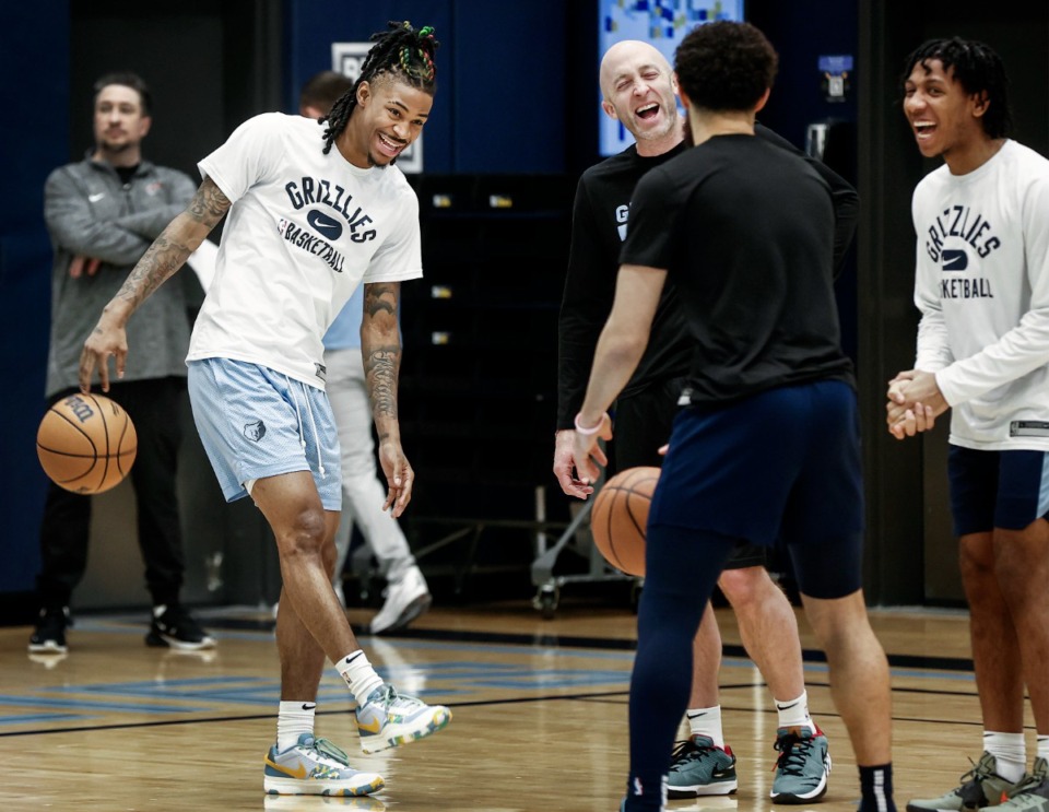 <strong>Memphis Grizzlies guard Ja Morant (left) jokes with his teammates during practice on Tuesday, March 21, 2023.</strong> (Mark Weber/The Daily Memphian)