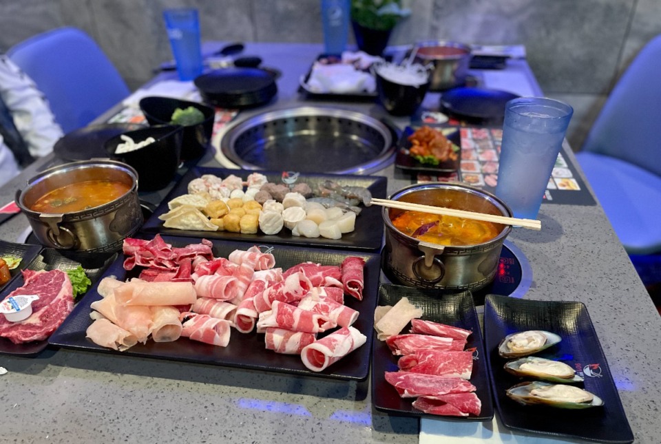 <strong>Food is brought to the table at 901 Hot Pot &amp; Korean BBQ on large platters.</strong> (Jennifer Biggs/The Daily Memphian)