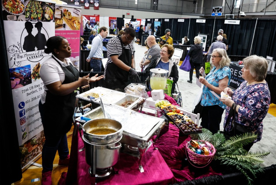 <strong>Visitors to the 25th annual Bartlett Business Expo try the food at Big Momma&rsquo;s and Granny&rsquo;s booth on Thursday, March 23, 2023.</strong> (Mark Weber/The Daily Memphian)