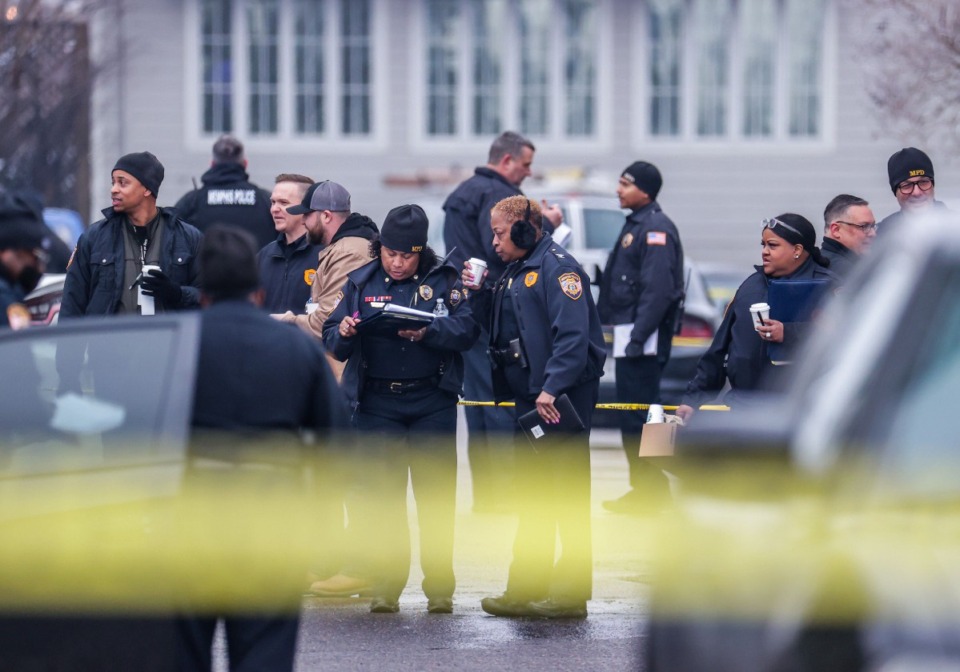 <strong>Memphis police officers take information at the scene of an officer involved shooting Feb. 2, 2023. </strong>(Patrick Lantrip/The Daily Memphian file)