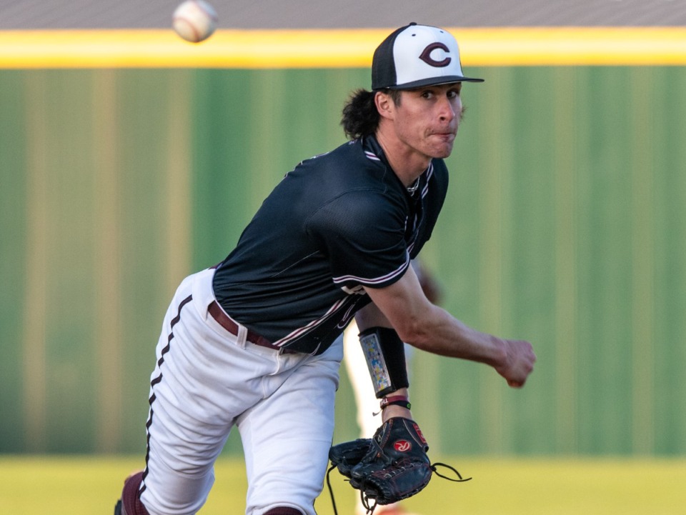 <strong>Collierville pitcher Thomas Crabtree pitches against crosstown rival CBHS at Collierville High School, Monday, March 27, 2023.</strong>&nbsp;(Greg Campbell/Special to The Daily Memphian)