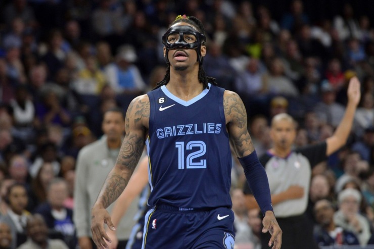 Memphis Grizzlies star Ja Morant removed his medically mandated face mask during their game against the Los Angeles Clippers on March 29. &ldquo;It&rsquo;s over with now. If I get hit in my nose again, oh well. A little war wound,&rdquo; he said. (Brandon Dill/AP