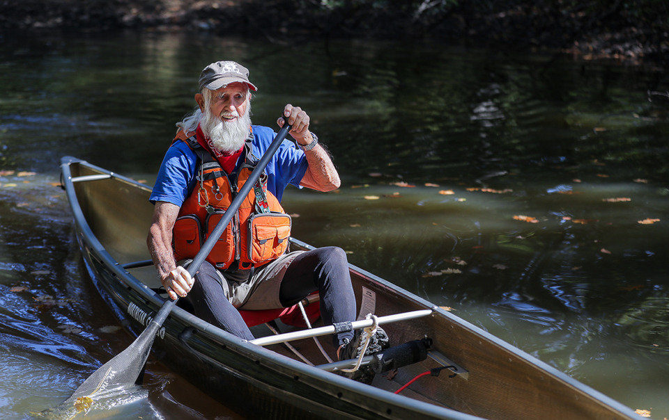 <strong>Dale Sanders takes a lap in his canoe on his lake Oct. 13, 2022.</strong> (Patrick Lantrip/The Daily Memphian file)