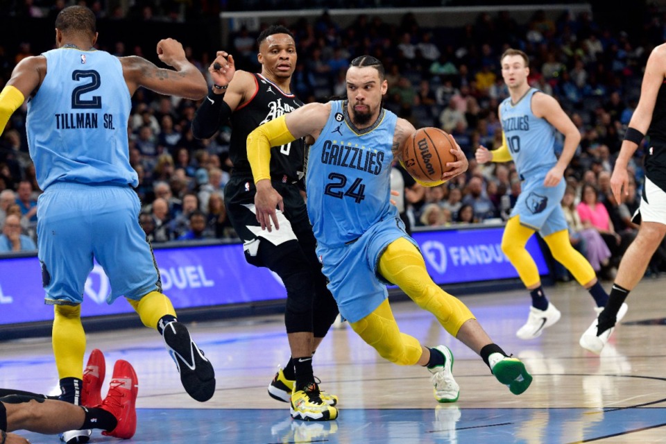 <strong>Memphis Grizzlies forward Dillon Brooks (24) drives past Los Angeles Clippers guard Russell Westbrook (0) in the first half of an NBA basketball game Wednesday, March 29, 2023, in Memphis, Tenn.</strong> (AP Photo/Brandon Dill)