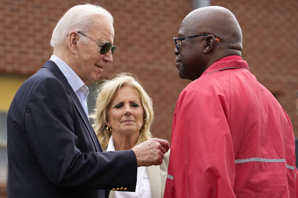 <strong>President Joe Biden talks with Rolling Fork, Miss., Mayor Eldridge Walker, right, as he and first lady Jill Biden arrive to survey the damage after a deadly tornado and severe storm moved through the area in Rolling Fork, Miss., March 31.</strong> (Carolyn Kaster/AP Photo)