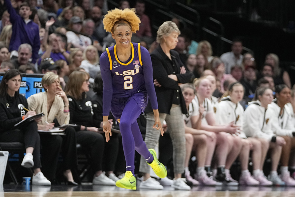 <strong>Former Central High and Whitehaven High star Jasmine Carson reacts to her three pointer for LSU during the NCAA Women's Final Four championship basketball game against Iowa Sunday, April 2, 2023, in Dallas.</strong> <strong>LSU beat Iowa 102-85.</strong> (Darron Cummings/AP Photo)