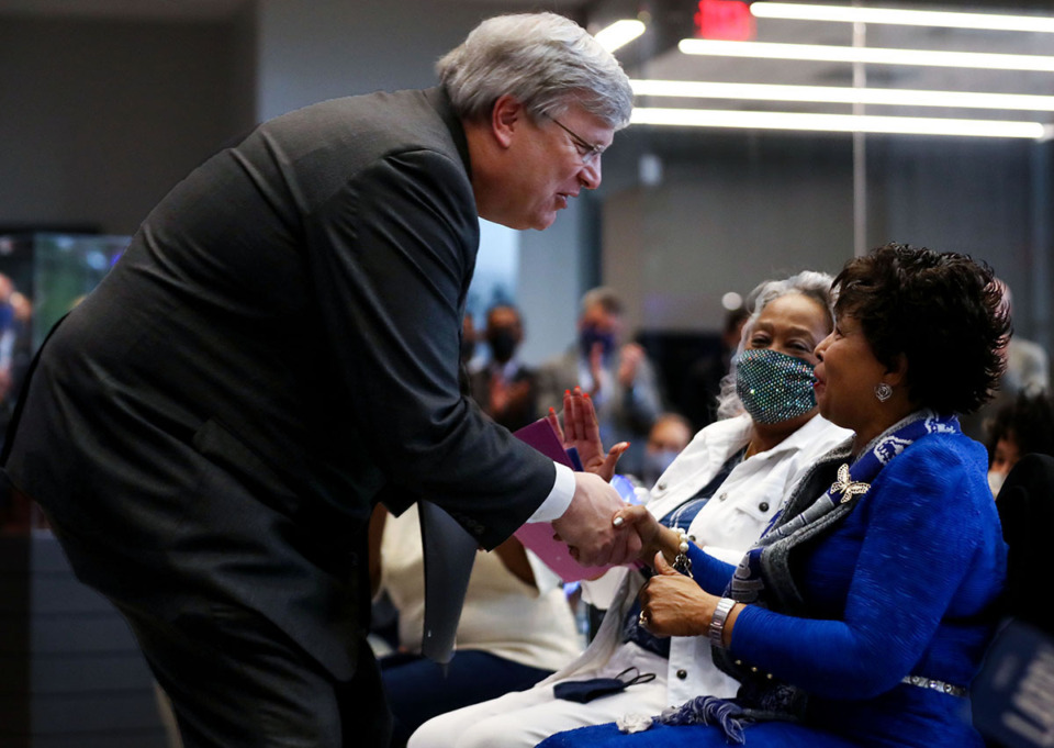 <strong>Memphis Mayor Jim Strickland hands Vicki Finch, wife of the late Larry Finch, a proclamation after speaking at a ceremony honoring her husband at the University of Memphis Oct. 28, 2021.</strong> (Patrick Lantrip/The Daily Memphian file)