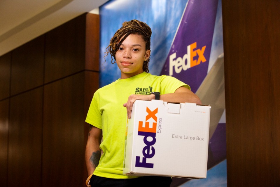 <strong>Keishuna Williams is the first person in her family to earn a college degree. She did it working part-time at night in the FedEx hub.</strong> (Ziggy Mack/Special to The Daily Memphian)