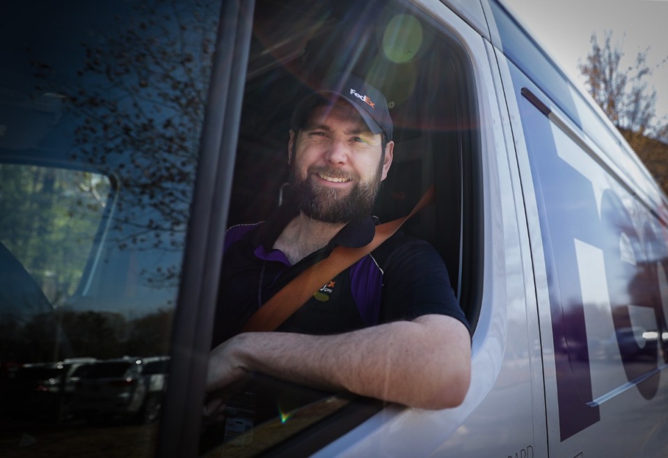 <strong>Jacob Tucker can drive 15 routes by memory and another 15 with technical assist, including Google Maps, loaded on the device in his truck.</strong> (Patrick Lantrip/The Daily Memphian)