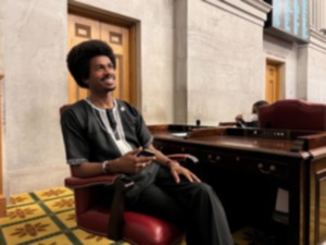 State Rep. Justin Pearson (D-Memphis) sits at his desk on the floor of the Tennessee House of Representatives on Thursday, Feb. 9. He was sworn in earlier that morning. (Ian Round/The Daily Memphian)