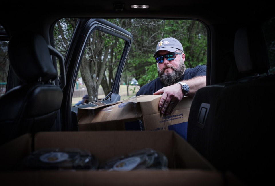 <strong>Graham Stafford loads up his truck to deliver meals to the residents of Covington who were effected by last week's tornado April 4.</strong> (Patrick Lantrip/The Daily Memphian)