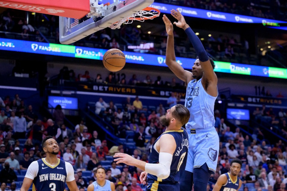 <strong>Memphis Grizzlies forward Jaren Jackson Jr. (13) dunks over New Orleans Pelicans center Jonas Valanciunas (17) on April 5, 2023.</strong> (Matthew Hinton/AP)